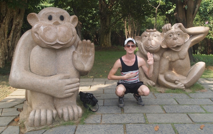 Caleb poses with the monkeys