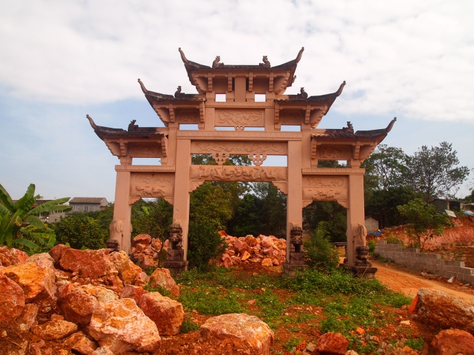 gate surrounded by reddish stones