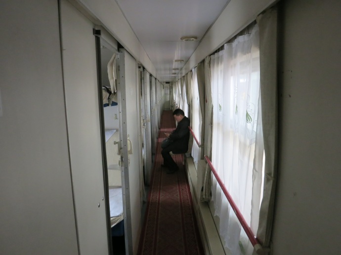 the aisle of the soft sleeper cars ~ where people can have some solitude - photo by Mike